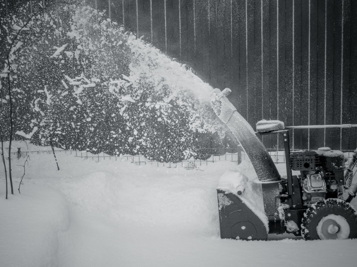 Snowblower at work on a winter day