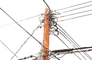 Utility pole hung with electricity power cables