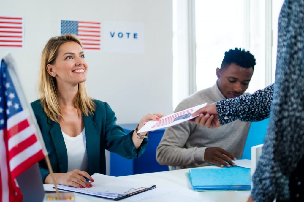 people voting in polling place, usa elections and coronavirus