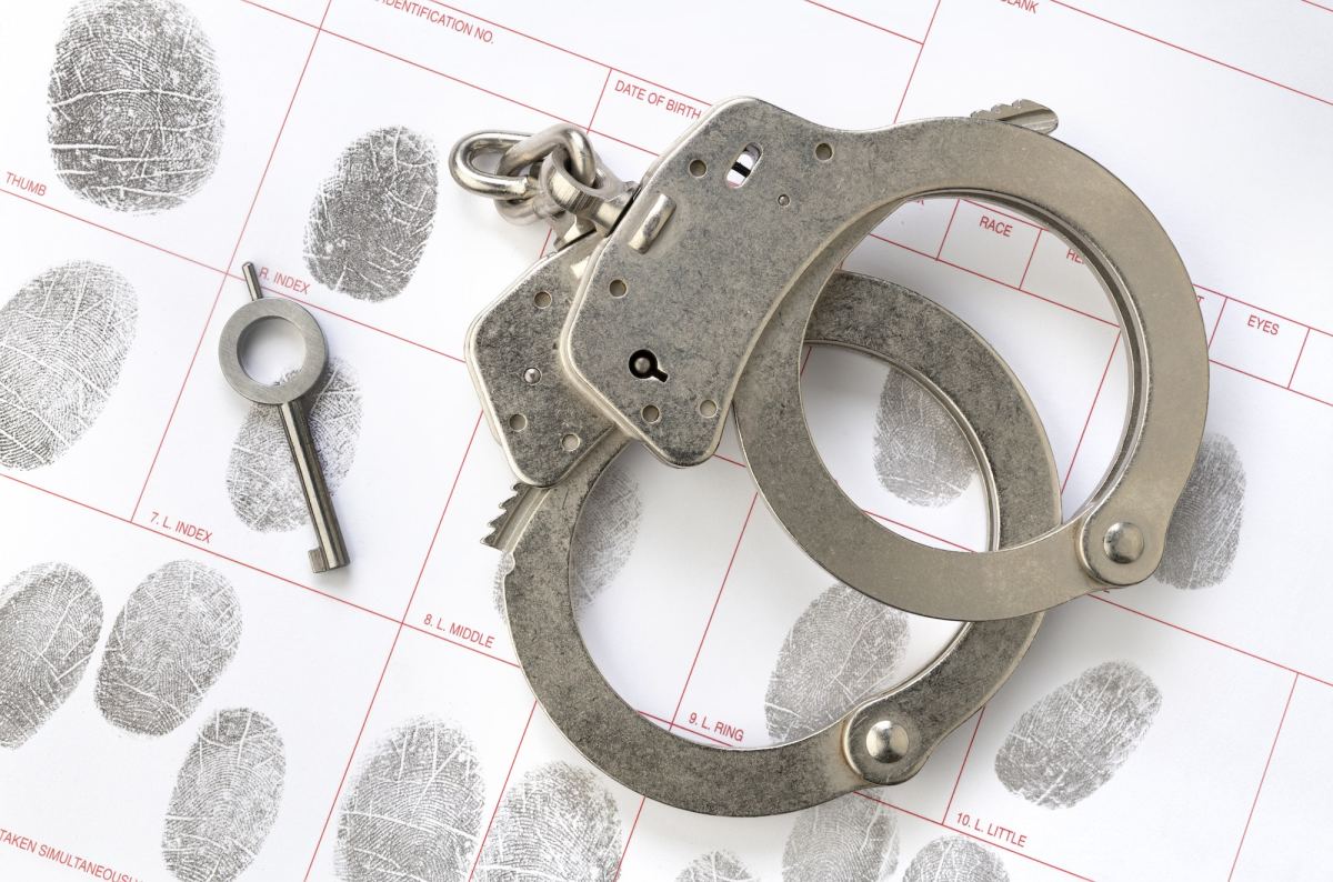 handcuffs on fingerprint sheet