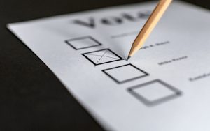 pencil checking box on voting ballot